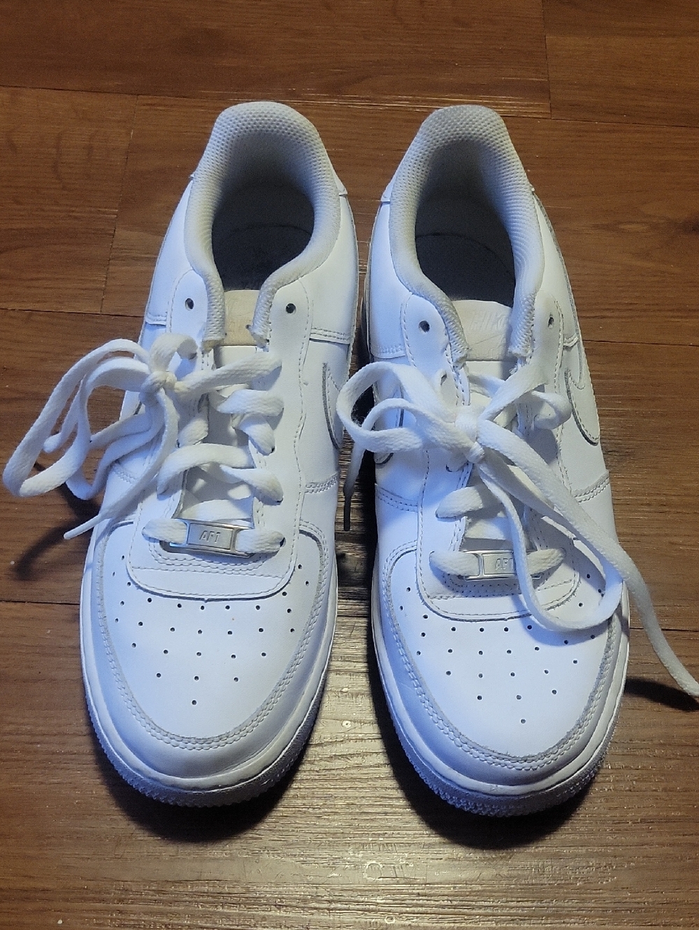 Nike Kids White Leather Sneakers with Lace-Up Closure